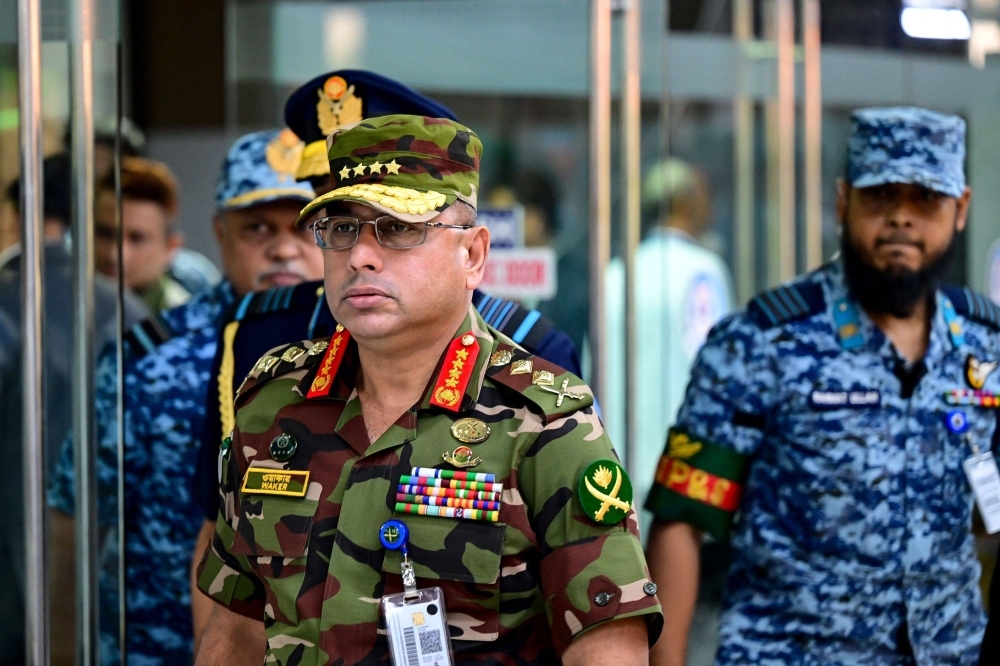 Gen. Waker-uz-Zaman, Bangladesh's army chief, arrives at Dhaka International Airport to receive Nobel laureate Muhammad Yunus on Aug. 8 to lead the country's interim government. Gen. Waker-uz-Zaman, Bangladesh's army chief, arrives at Dhaka International Airport to receive Nobel laureate Muhammad Yunus on Aug. 8 to lead the country's interim government.