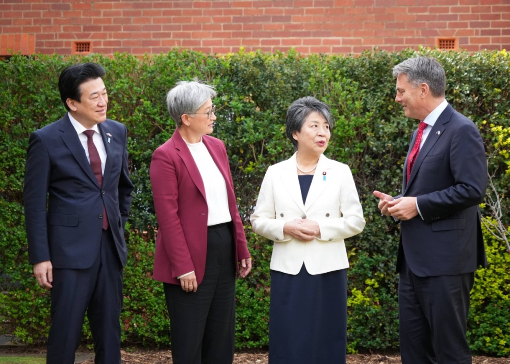 Japanese Defense Minister Minoru Kihara (left), Australian Foreign Minister Penny Wong (center left), Japanese Foreign Minister Yoko Kamikawa (center right) and Australian Defense Minister Richard Marles gather for their two-plus-two meeting in Queenscliff, Australia, on Thursday.