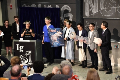Takanori Takebe (behind the lectern) speaks after his team of researchers and he were awarded the Ig Nobel Prize in physiology at the Massachusetts Institute of Technology in Cambridge, Massachusetts, on Thursday. Takanori Takebe (behind the lectern) speaks after his team of researchers and he were awarded the Ig Nobel Prize in physiology at the Massachusetts Institute of Technology in Cambridge, Massachusetts, on Thursday.