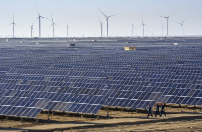 Solar panels and wind turbines at a power plant in Hami in China's Xinjiang region. The U.S. and other countries have described China’s actions against Uyghurs in the Xinjiang region, a key cog in the cleantech supply chain, as a genocidal campaign aimed at erasing an entire culture. Solar panels and wind turbines at a power plant in Hami in China's Xinjiang region. The U.S. and other countries have described China’s actions against Uyghurs in the Xinjiang region, a key cog in the cleantech supply chain, as a genocidal campaign aimed at erasing an entire culture.
