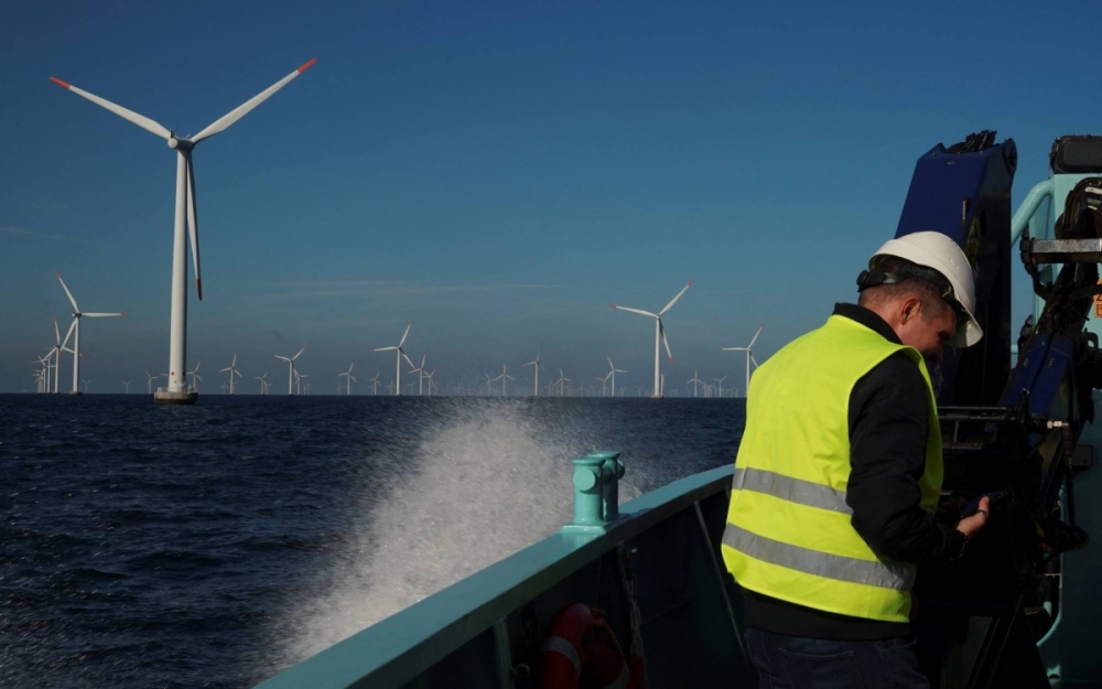 Вид на ветряные турбины морской ветряной электростанции недалеко от Нистеда, Дания, 4 сентября 2023 года. Вид на ветряные турбины морской ветряной электростанции недалеко от Нистеда, Дания, 4 сентября 2023 года.