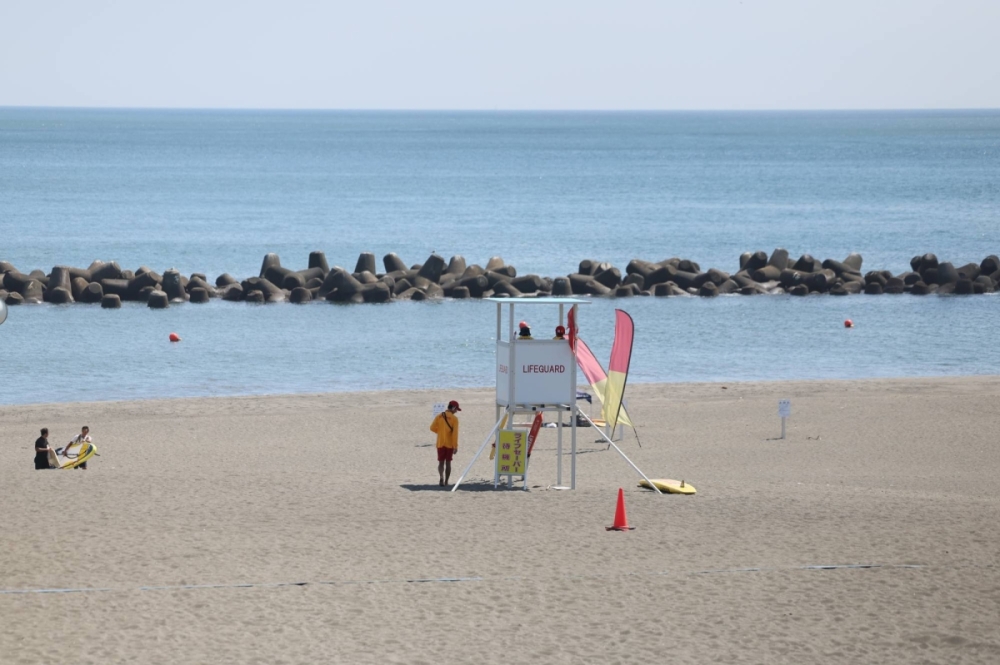 A nearly empty beach in Hiratsuka, Kanagawa Prefecture, on Aug. 10 following warnings of the potential of a major earthquake originating in the Nankai Trough A nearly empty beach in Hiratsuka, Kanagawa Prefecture, on Aug. 10 following warnings of the potential of a major earthquake originating in the Nankai Trough