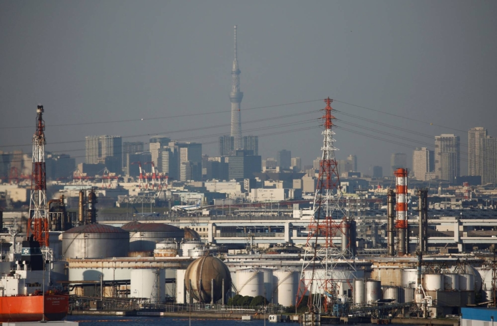 A portion of the Tokyo skyline from an observatory deck at an industrial port in Kawasaki A portion of the Tokyo skyline from an observatory deck at an industrial port in Kawasaki