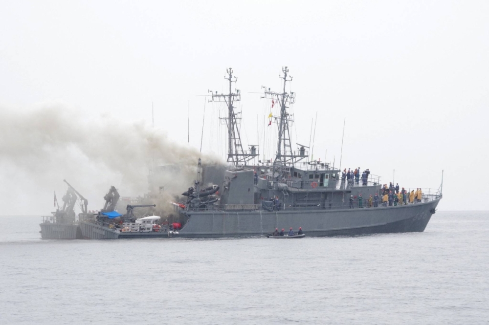 Smoke rises from the MSDF's Ukushima minesweeper after a fire broke out aboard the vessel off the coast of Oshima island, in Munakata, Fukuoka Prefecture, earlier on Sunday. Smoke rises from the MSDF's Ukushima minesweeper after a fire broke out aboard the vessel off the coast of Oshima island, in Munakata, Fukuoka Prefecture, earlier on Sunday.