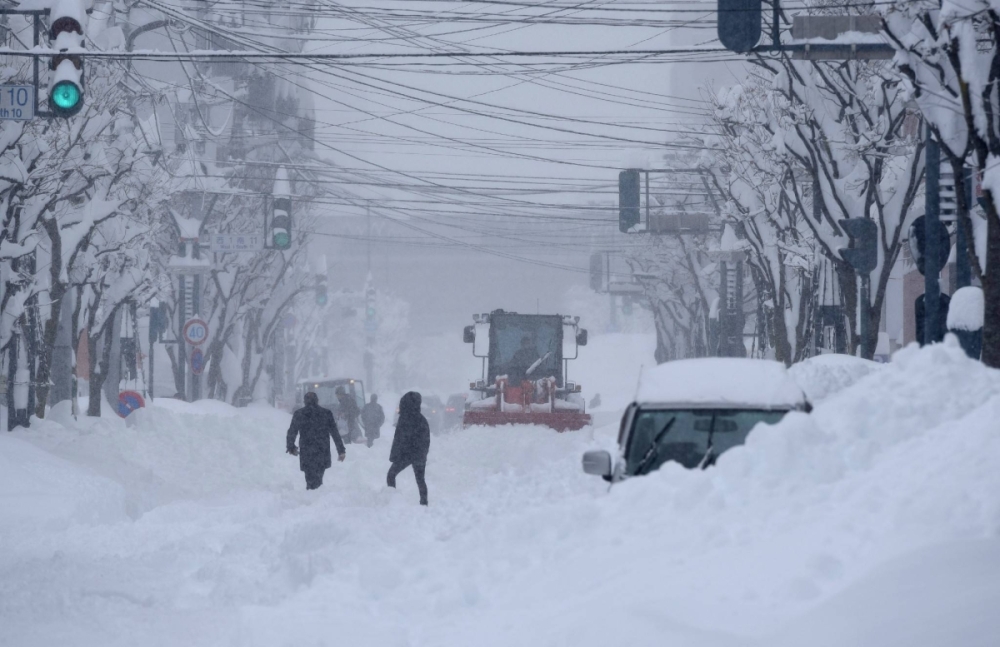Snow-covered streets in Obihiro, Hokkaido, on Tuesday Snow-covered streets in Obihiro, Hokkaido, on Tuesday