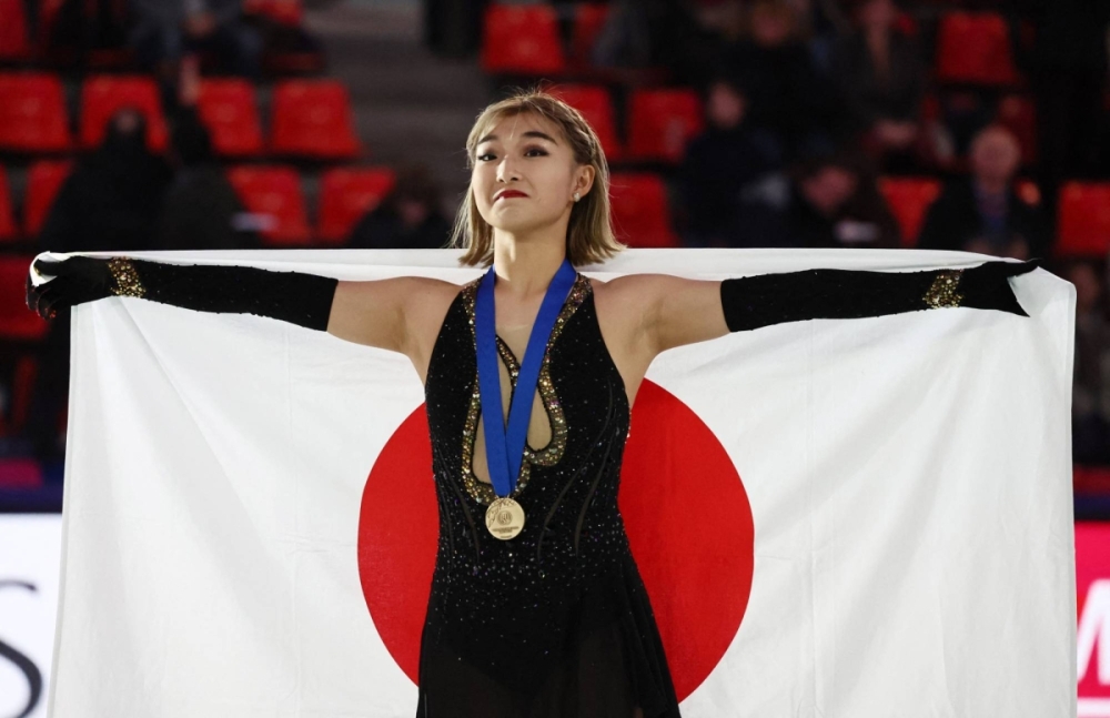 Japan's Kaori Sakamoto celebrates after finishing in third place at the ISU Grand Prix of Figure Skating in Grenoble, France on Dec. 7, 2024. Japan's Kaori Sakamoto celebrates after finishing in third place at the ISU Grand Prix of Figure Skating in Grenoble, France on Dec. 7, 2024.