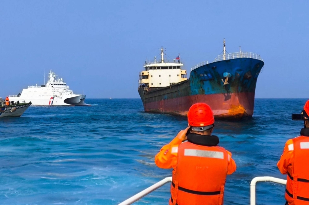 The Taiwanese Coast Guard detains Togolese-registered, Chinese-crewed cargo ship Hongtai in Penghu, Taiwan, on Tuesday after a subsea telecoms cable was severed off the islands.