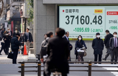 An electronic sign displays the benchmark Nikkei stock average on a street in Tokyo. The stock average has been range-bound between about 38,000 and 40,000 since hitting a new all-time high in July last year. An electronic sign displays the benchmark Nikkei stock average on a street in Tokyo. The stock average has been range-bound between about 38,000 and 40,000 since hitting a new all-time high in July last year.