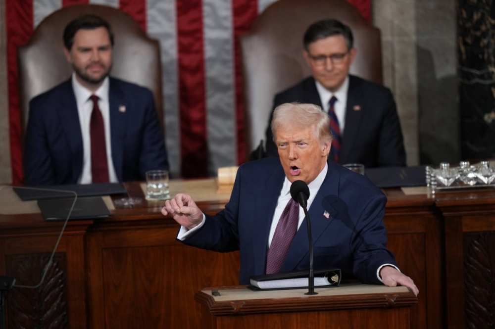 President Donald Trump delivers an address to a joint session of Congress in Washington on Tuesday. Some critics are questioning if the U.S. is shifting away from global leadership under his stewardship. President Donald Trump delivers an address to a joint session of Congress in Washington on Tuesday. Some critics are questioning if the U.S. is shifting away from global leadership under his stewardship.