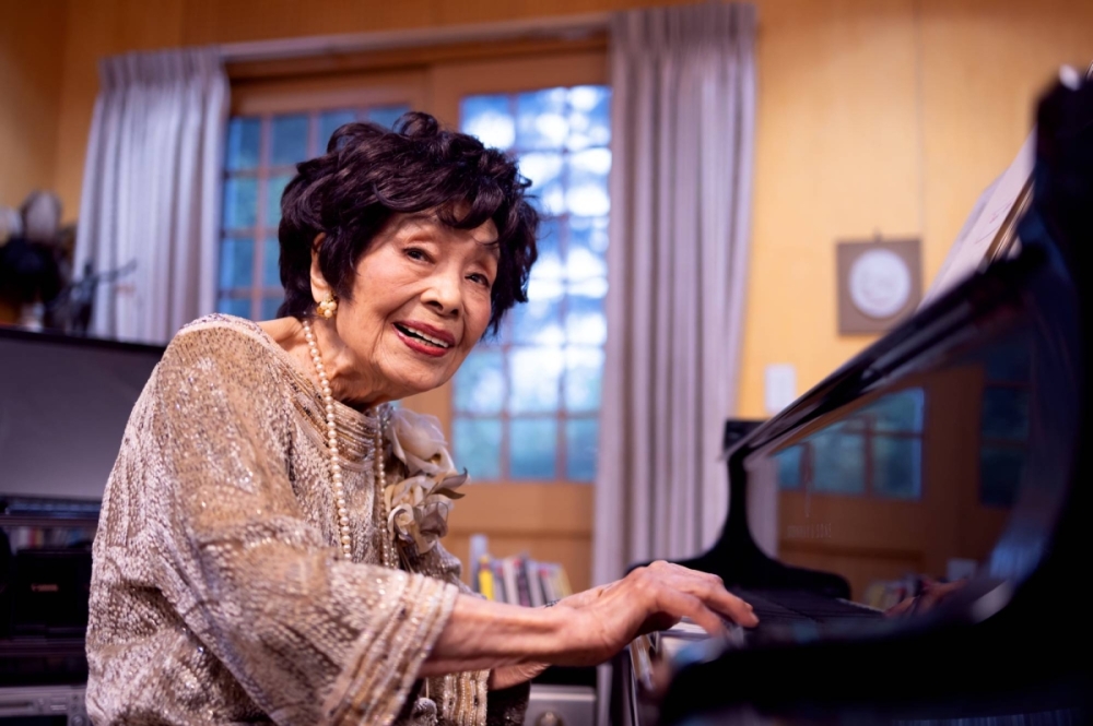Mayako Muroi, 104, can still remember touching her first piano almost a century ago. Mayako Muroi, 104, can still remember touching her first piano almost a century ago.