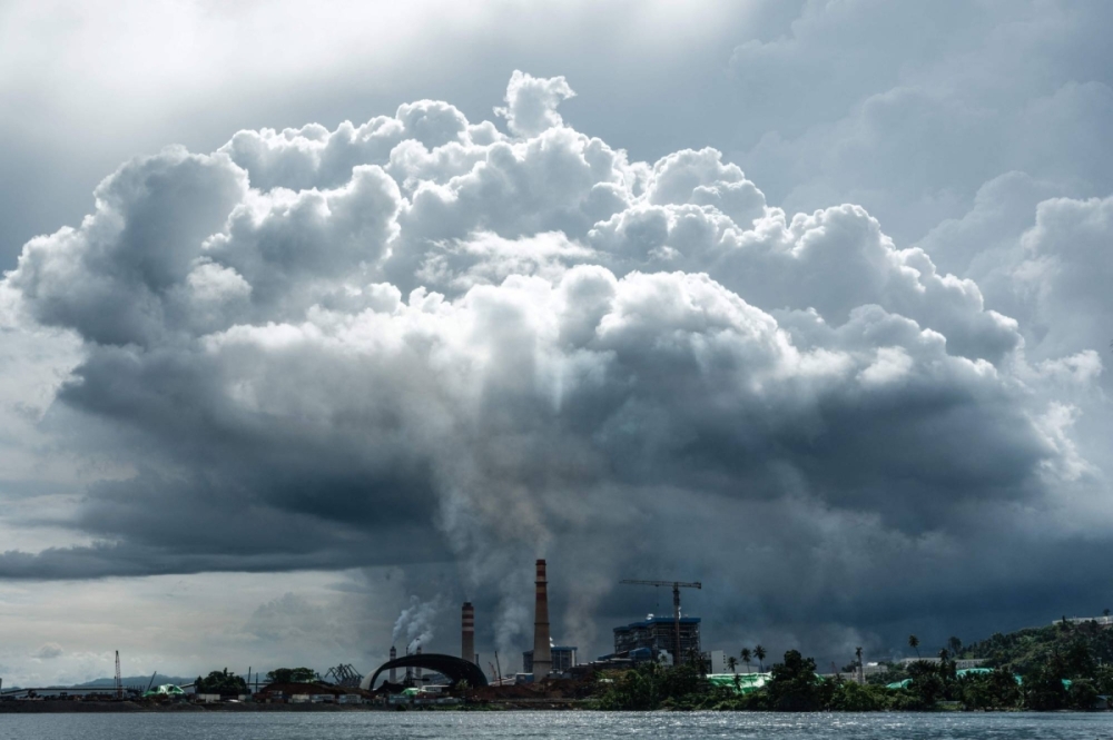 Smoke surrounds WBIP, a major nickel processing and smelting hub, forming a human-made cloud in Gemaf, Central Halmahera, North Maluku, Indonesia, on April 13. Smoke surrounds WBIP, a major nickel processing and smelting hub, forming a human-made cloud in Gemaf, Central Halmahera, North Maluku, Indonesia, on April 13.