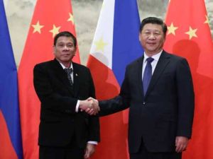 In this file photo President Rodrigo Duterte (left) shakes hands with Chinese President Xi Jinping prior to their bilateral meeting at the Great Hall of the People in Beijing on Oct. 20, 2016.