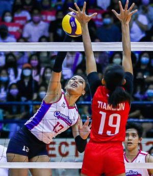 PetroGazz outside hitter Nicole Tiamzon blocks Creamline’s Celine Domingo during the Philippine Volleyball League (PVL) Open Conference finals on Friday, April 8, 2022, at the Ynares Center in Antipolo City. PVL PHOTO