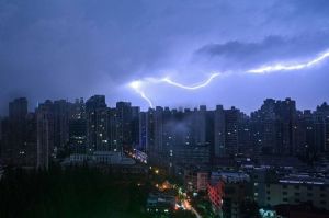 STORMY DAYS AHEAD? Lightning strikes during a thunderstorm over Shanghai on Monday, July 11, 2022. AFP PHOTO