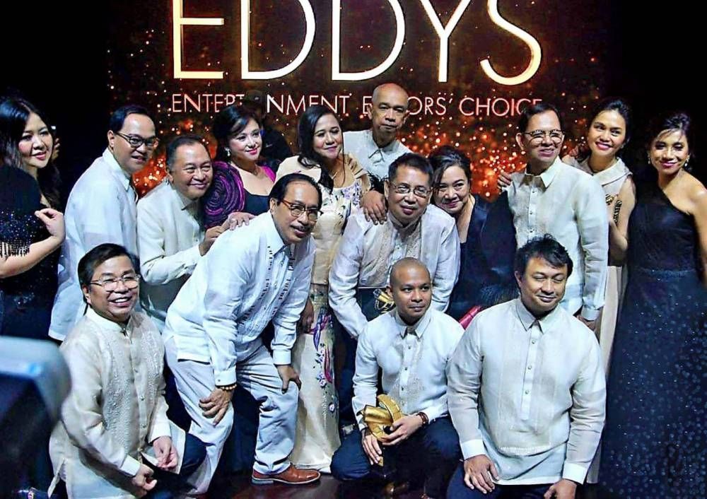 Eugene Asis (first row, second from left) and the Society of Entertainment Editors (SPEEd)during the last onsite edition of The Eddys in 2019. The fourth awards ceremony was held onlinedue to pandemic restrictions.