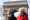 Two women wearing face masks walk near the Arc de Triomphe in France’s capital Paris on Dec. 23, 2021. XINHUA FILE PHOTO