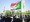 A protester holds a national flag during a sit-in demanding the dissolution of interim government, outside the presidential palace in central Khartoum, on Monday. - AFP