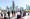 People perform Friday noon prayer in an area close to their workplace on the first working Friday in Dubai. - AFP 