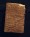 A clay tablet from ca. 1750 B.C., inscribed with “The Exaltation of Inanna,” a poem attributed to Enheduanna, included in “She Who Wrote,” an exhibition at the Morgan Library and Museum in New York, Nov. 7, 2022. (Lila Barth/The New York Times)