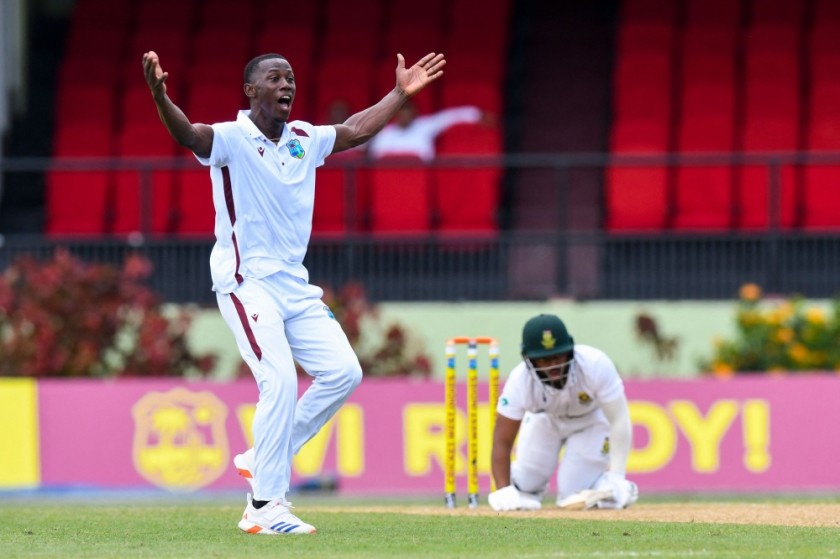 West Indies' Shamar Joseph (left) celebrates defeat against South Africa's Temba Bavuma (right) on the first day of the second Test match