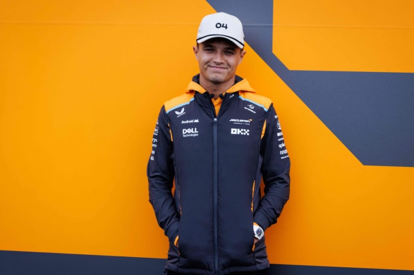 McLaren's British driver Lando Norris poses for a photo in the paddock ahead of the Formula One Grand Prix at Zandvoort
